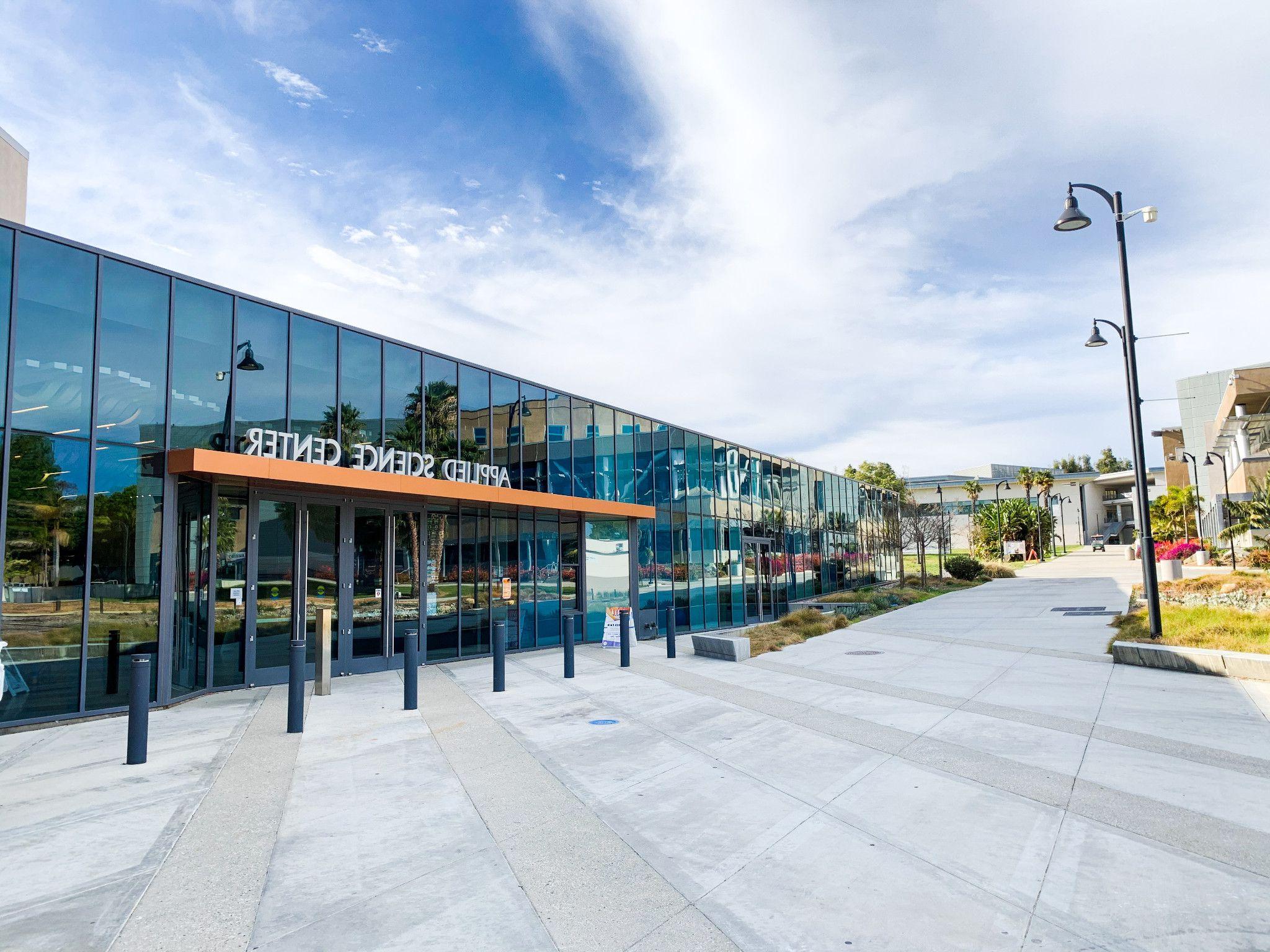 East side of the Applied Science Center Building under a sunny sky